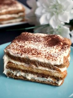 a piece of cake sitting on top of a blue plate