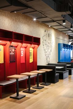 the lockers are lined up against the wall with numbers on them and numbered in different colors