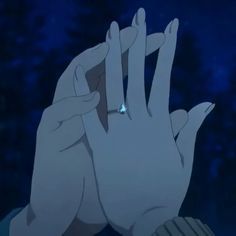 two hands reaching up to touch each other's fingers in front of a blue background