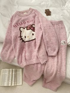 Pink Soft Kitty Fuzzy Pajama Set This adorable Pink Soft Kitty Fuzzy Pajama Set is the perfect combination of cute and comfortable. Made with soft fuzzy material, it will keep you cozy all night long. The colorful pink design adds a touch of fun and personality to your sleepwear. Get ready for a good night's sleep in this lovely pajama set. Pijama Da Hello Kitty, Winter Pajamas Women, Hello Kitty Gifts, Kitty Clothes, Hello Kitty Clothes, Pyjamas Womens, Pajama Suit, Flannel Women