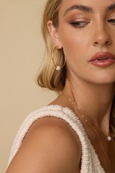 Name a more classic layer. The single pearl is SUCH a statement and you ought to add it to all your layers. A simple 15” Gold Filled chain is adorned by a single fresh water pearl and finished with a lobster closure with 2” extender. Classic Jewelry With Pearl Charm, Classic Everyday Pearl Drop Jewelry, Simple Everyday Jewelry With Pearl Charm, Chic Single Strand Pearl Jewelry, Classic Everyday Pearl Jewelry, Feminine Everyday Pearl Jewelry, Everyday Feminine Pearl Jewelry, Chic Pearl White Jewelry With Pearl Drop, Everyday Elegance Pearl Chain Jewelry