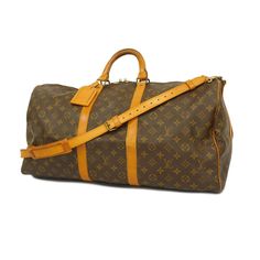 Used Louis Vuitton Boston Bag Monogram Keepall Bandouliere 55 M41414 Brown Men's Women's (Sku: Gzl13glg) === General === Brand : Louis Vuitton === Design === Type : Boston Bag Color : Brown Hardware Color : Gold Gender : Men,Women === Included Items === Accessories : Name Tag, Shoulder Strap Accessories Notice : Before Purchasing, Please Refer To The Images Of The Accessories Included With The Item. === Condition === Condition : Used (Good) Ranking : Rank Ab Used - Traces Of Usage, Scratches / Dirt Can Be Seen But Generally In Good Condition Seller Ranking : Rank Ab Overall Scratches : Slight Overall Dirt : Slight Overall Traces Of Use : Slight Condition Notice : Before Purchasing, Used Louis Vuitton, Boston Bag, Name Tag, Louis Vuitton Bag, Luxury Branding, Shoulder Strap, Bag Lady, Louis Vuitton, Monogram