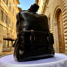 "This Italian leather Backpack is a true masterpiece of craftsmanship. Handmade in Florence, Italy, it combines luxurious materials and exquisite attention to detail. Elevate your style and travel in sophistication with this elegant backpack. . Size: Height: 39 cm (15.35 inches) Depth: 31 cm (12.20 inches) Width: 13 cm (5.12 inches) . The story of this backpack: In the heart of Florence, where the legacy of artisanal craftsmanship dances through the air like a melody, a workshop hums with the creation of a masterpiece--an Italian handmade leather backpack. This story unfolds within the walls where skilled hands weave dreams into reality, bringing forth a men's backpack that embodies the essence of tradition, quality, and timeless elegance. Selected with meticulous care, the leather chosen High-end Travel Backpack Shoulder Bag, High-end Backpack For Daily Use, High-end Leather Backpack, High-end Rectangular Backpack For Daily Use, High-end Rectangular Travel Backpack, Luxury Leather Standard Backpack, Luxury Travel Backpack Rectangular, Luxury Rectangular Travel Backpack, Designer Rectangular Leather Backpack For Business