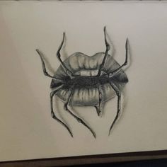 a black and white drawing of a bug