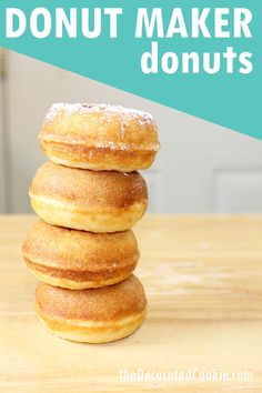 a stack of donuts sitting on top of a wooden table