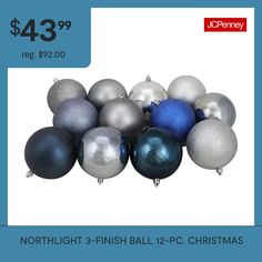 a group of christmas ornaments sitting next to each other on a blue and white background