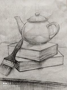 a pencil drawing of a teapot on top of books with a brush in the foreground