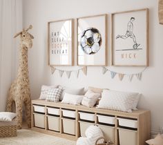 a child's room decorated in neutrals and whites, with pictures on the wall