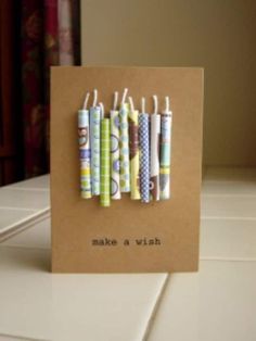 a card that says make a wish with colorful toothbrushes