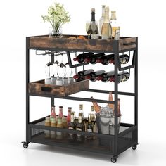 a bar cart filled with bottles and glasses