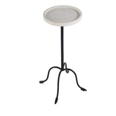 a white table with black legs and a metal stand on the top that has a small round