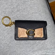 A Little Wallet To Hold Money Or Credit Cards That Can Be Attached To A Keychain Or Held In A Purse! Coach Coin Purse With Card Slots For Everyday Use, Elegant Gold Coach Coin Purse, Gold-tone Hardware Pouch Wallet, Chic Rectangular Wallets, Rectangular Coach Coin Purse For Gift, Coach Rectangular Wallet On Chain, Coach Rectangular Wallet On Chain For Everyday Use, Coach Gold Wallet For Everyday Use, Rectangular Wallet With Gold-tone Hardware For Daily Use