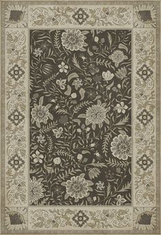 an intricately designed rug with flowers and leaves on the border, in brown tones