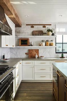 the kitchen is clean and ready for us to use it's marble counter tops