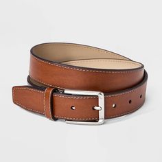 Whether you’re working in the office or lunching with friends, this Dress Belt from Goodfellow & Co™ adds the perfect finishing touch to your look. This dress belt is made from bonded leather for a comfortable and classic look. It also has a shiny silver buckle closure to complete the classy look and allows you to get a customized fit with multiple holes and loop. Pair with any of your pants to feel great all day. Goodfellow & Co™: Where style & fit are always in good company. Brown Belts For Spring Workwear, Classic Formal Belts For Spring, Classic Spring Formal Belt, Classic Fitted Belts For Fall, Casual Belts For Workwear In Spring, Casual Belts For Spring Workwear, Casual Spring Belts For Workwear, Casual Brown Belt For Workwear, Casual Brown Belt For Work