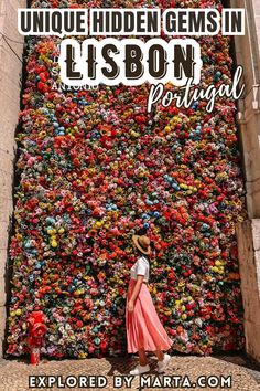 a woman standing in front of a wall covered with gummy balls and text that reads unique hidden gems in lisbon portugal