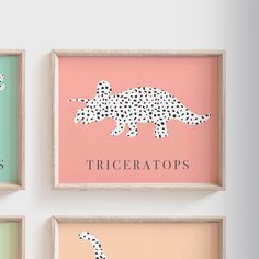 three framed art pieces depicting different animals on pink, green, and blue background with the words triceratops