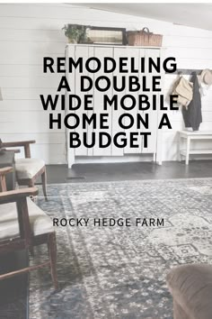 a living room with a couch, chair and rug on the floor that says remodeling a double wide mobile home on a budget