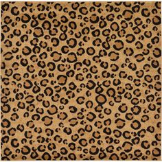 a brown and black animal print pattern on a piece of cardboard with the words,'leopard