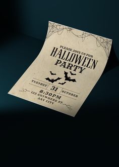 an old halloween party flyer with bats and spider webs on the front, black background