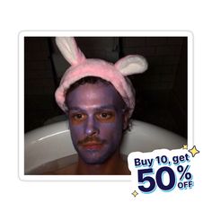 a man with bunny ears on his head in a bathtub for 50 % off