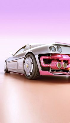 a silver sports car with pink exhaust pipes on it's hood is shown in front of a purple background