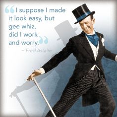 a man in a suit and top hat holding a cane with a quote on it