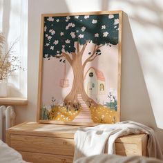 an art work is displayed on the wall next to a bed