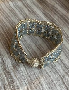 Cuff beaded bracelets with intricate patterns from Japanese beads and pearls. Elegant Beaded Cuff Bracelet As Gift, Beaded Cuff Jewelry Gift, Traditional Beaded Cuff Bracelet Bangle, Elegant Beaded Cuff Bracelet, Blue Beaded Cuff Bracelet Gift, Netted Bracelet, Japanese Beads, Beaded Jewelry Diy, Jewelry Diy