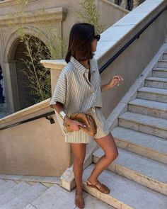 Striped matching set shorts-and-shirt, flat sandals, clutch, summer outfits, vacation outfits, packing list Greek islands | Greece outfit ideas City Break Outfit Summer, Vocation Outfit, Greece Outfit Ideas, Vacation Fits, City Break Outfit, Italy Fits, Greece Outfit, Honeymoon Outfits