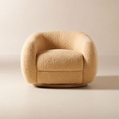 the chair is made out of wool and has a rounded shape