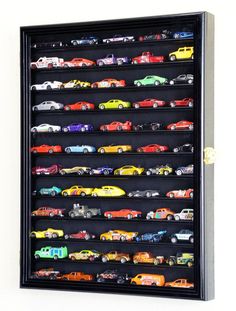 a display case filled with lots of toy cars