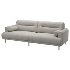 a gray couch sitting on top of a white floor