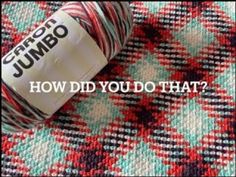 a spool of yarn sitting on top of a plaid blanket with the words jumpo how did you do that?