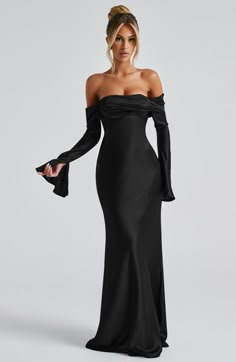 Be obsessed with Selene, an elegant, bias cut design made from our luxe textured satin which skims beautifully over the figure. With a twist panel bardot neckline and long, flared sleeves, this maxi style is finished with waist tie to the side seams. Pair with tonal heels and soft waves. 



Colour: Black.

Premium textured satin.

Fully lined.

Bardot neckline with twisted panel.

Bias cut design.

Long sleeves with slighted flared split cuffs.

Waist tie attached at side seams.

Skims over the Black Classy Gown, Black Gala Dress Long, Black Bridesmaid Dresses Long Sleeve, Black Dresses Long Sleeve, Long Sleeve Formal Dresses, Black Tie Wedding Attire, Black Dress Wedding, Elegance Outfit, Wedding Guest Black Tie