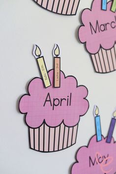 some cupcakes with candles on them and the words march spelled in small letters