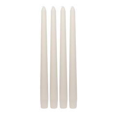 three white candles sitting next to each other