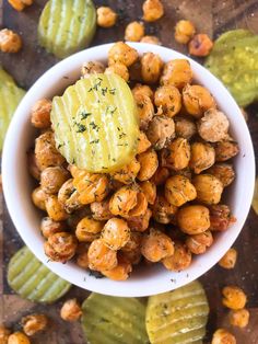 a white bowl filled with roasted chickpeas