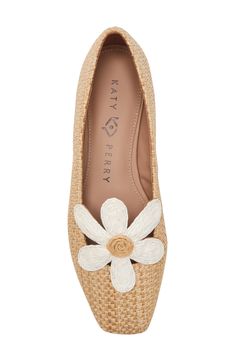 A whimsical floral appliqué stands out at the vamp of a woven flat fashioned with a squared-off toe for contemporary appeal. Memory foam cushioning Synthetic and textile upper and lining/synthetic sole Imported Spring Vacation Flats With Removable Insole, Spring Floral Embroidered Closed Toe Flats, Spring Floral Embroidery Closed Toe Flats, Beige Flats With Removable Insole For Spring, Elegant Spring Flats For Vacation, Spring Synthetic Closed Toe Flats, Elegant Spring Vacation Flats, Spring Fabric Flats, Beige Flats With Woven Sole For Spring