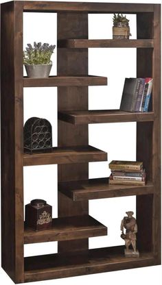 an open book shelf with books and other items on it's shelves, against a white background