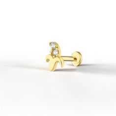 A Fun and Fruity Touch This tiny banana-shaped ear piercing is perfect for adding a tropical touch to your style. ⭐️About the Tragus Ear Piercing⭐️ 🔸Real 14K Gold: Crafted from real 14K gold, this earring is not only beautiful but also durable.  🔸A Fun Gift for Fruit Lovers Featuring a charming banana design, this earring makes a delightful gift for anyone who loves fruit-themed jewelry. Ideal for birthdays, holidays, or just because. It's a thoughtful present for daughters, friends, or anyone Banana Earrings, Banana Design, Ear Piercings Tragus, Tragus Jewelry, Tragus Earring, Minimal Gold, Mothers Heart, Tragus Piercing, Tragus Earrings