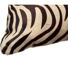 a zebra print pillow on a white background