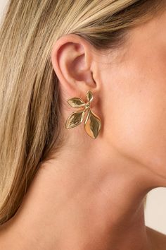 Elevate your style with our Dusk Reverie Gold Leaf Earrings. These earrings have a unique and elegant design that adds a touch of sophistication to any outfit. Perfect for any occasion, they are versatile and durable, making them a must-have accessory for your jewelry collection. These gold earrings feature gold hardware, a branch design with four leaf petals and secure back postings.  Earrings measure 1.75" in length  Lead Compound Manufactured in Korea Teacher Wedding, Preppy Girls, Going Out Looks, Corporate Chic, Rush Dresses, Fall Staples, Gold Leaf Earrings, Branch Design, Concert Looks