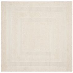 a white rug with square and rectangles in the middle, on a white background