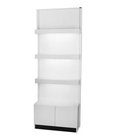 a white shelving unit with three shelves