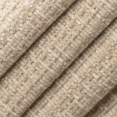 close up view of fabric textured in neutral colors