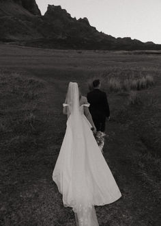 Looking for the perfect elopement spot? Consider Isle of Skye! It's quaint and stunning, offering rugged cliffs, serene lochs, and rolling hills. We'll help you find the ideal spot to say 'I do' amidst Scotland's natural beauty. Ready to make unforgettable memories? Contact us today at stephaniemariephoto.com and let's plan your elopement in Scotland! Rolling Hills