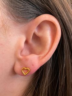 Beautiful textured 22k Gold over 925 Sterling Silver hollow Heart Shaped stud earrings. The hollow space inside the heart symbolizes limitless love for yourself, your growth, and your wellbeing. Self-care in style with these Heart Shaped Studs. Push back closure. Gold Open Heart Earrings For Mother's Day, Gold Pierced Heart Earrings For Mother's Day, Gold Open Heart Earrings For Anniversary, Gold Heart Cut Heart Earrings For Everyday, Mother's Day Yellow Gold Heart Earrings For Pierced Ears, Casual Gold Heart Earrings, Gold Heart Cut Pierced Earrings, Gold Hypoallergenic Heart Cut Earrings, Hypoallergenic Gold Heart Cut Earrings