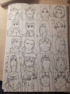 a bunch of anime faces drawn on paper