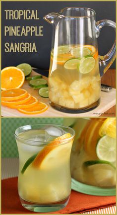 tropical pineapple sangria with orange slices and sliced limes in the glass pitcher